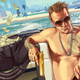 A shirtless man with a golden pistol drives away in a boat carrying a duffel bag of cash.